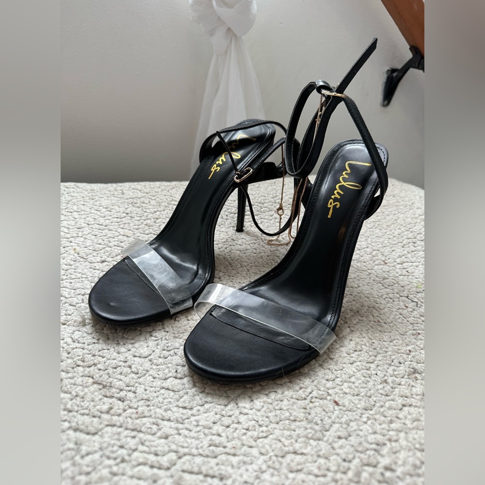 Black heels with anklet detail